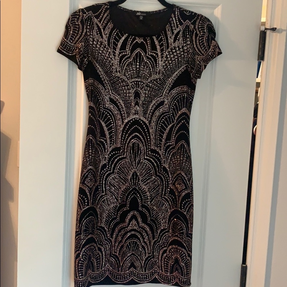 black dress with pink glitter detail